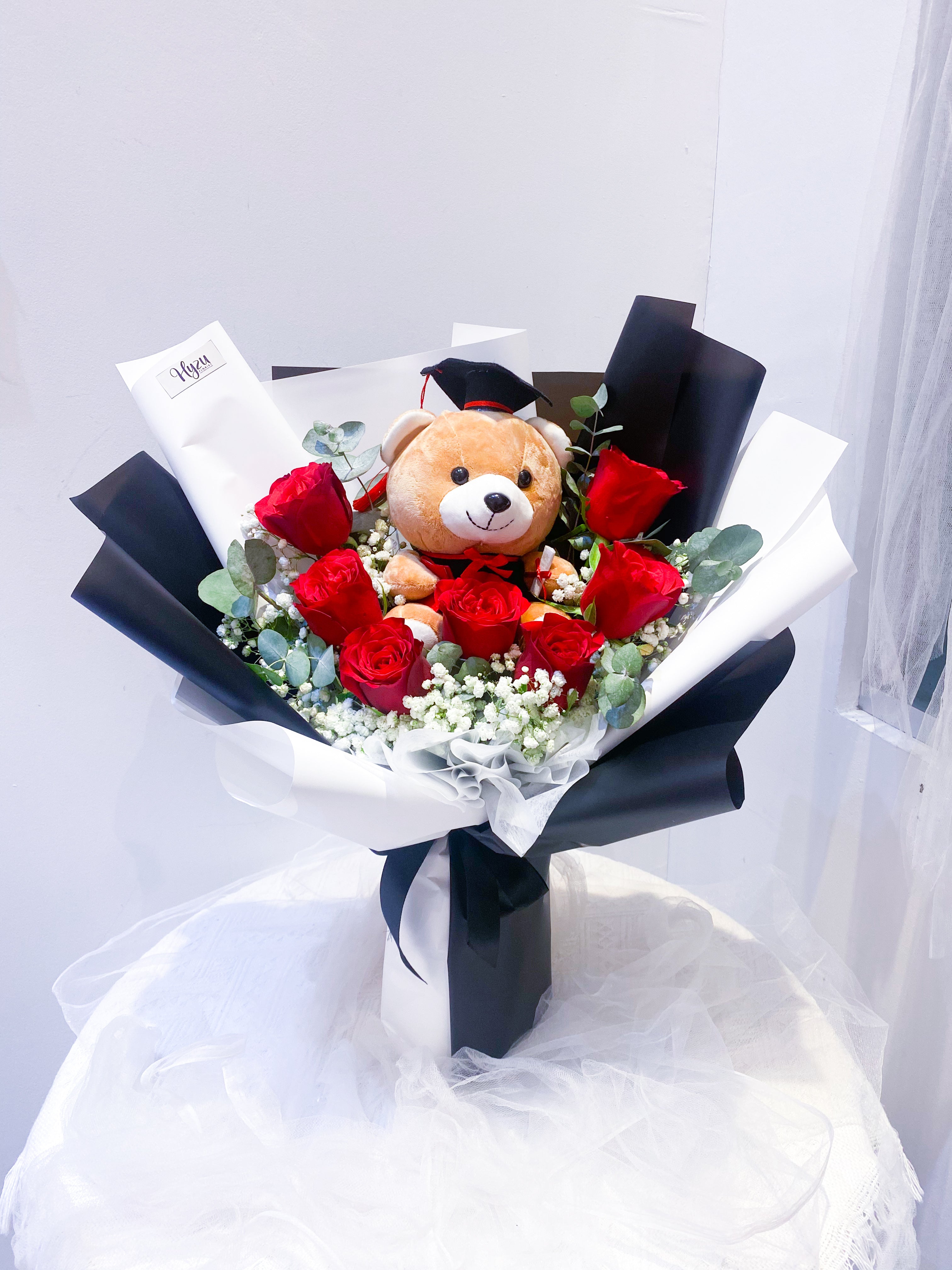 7 Stalks Fresh Roses With Grad Teddy